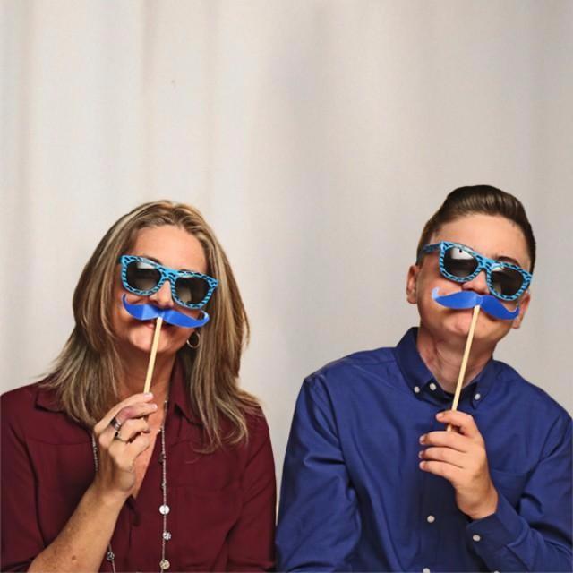 Corbin and his mom Lisa wearing the foundation's "blue mustache".
