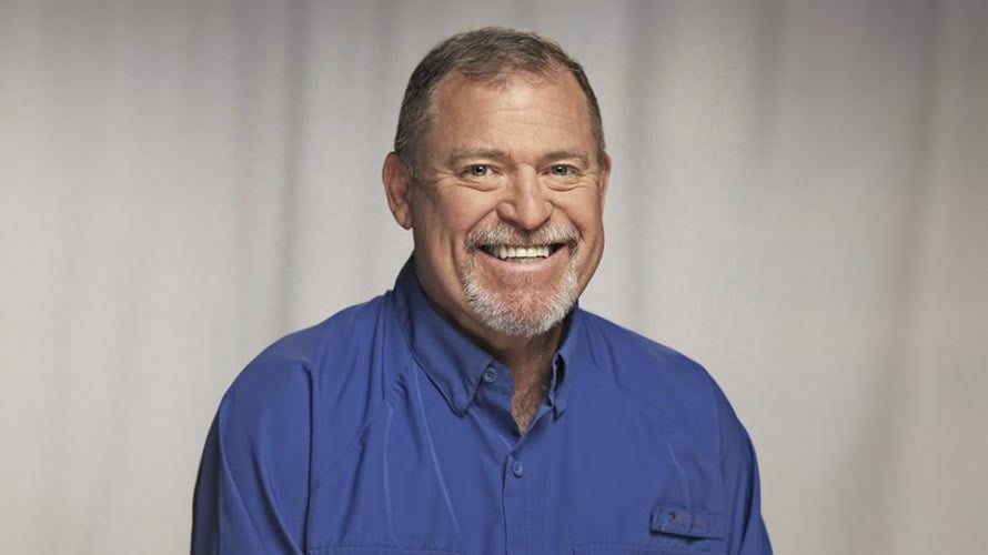 Headshot of a smiling Craig.