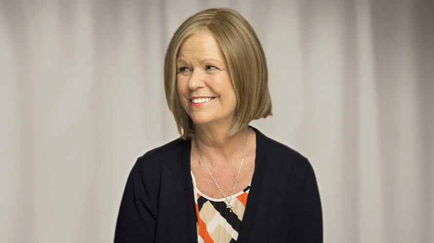 Smiling profile headshot of Donna, ovarian cancer survivor