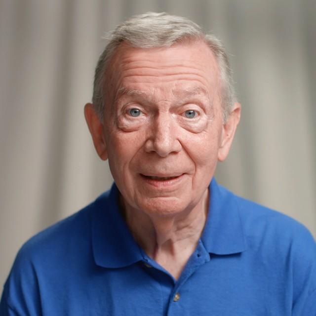 Smiling headshot of Howard, Moffitt Nutrition Volunteer with chemotherapy patients. 