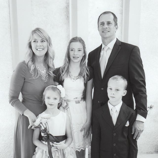 Joanna, breast cancer survivor, with her husband and three children.