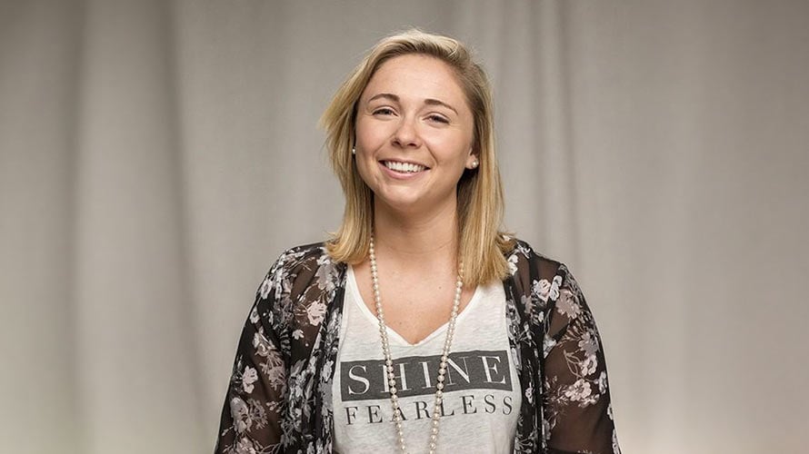 Smiling headshot of Madison, non-hodgkin lymphoma survivor.