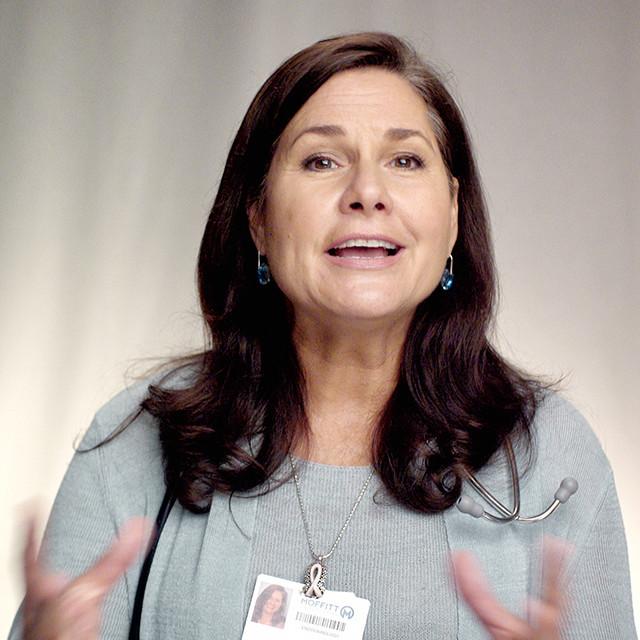Headshot of Nancy, Moffitt cancer center APRN, while talking passionately.