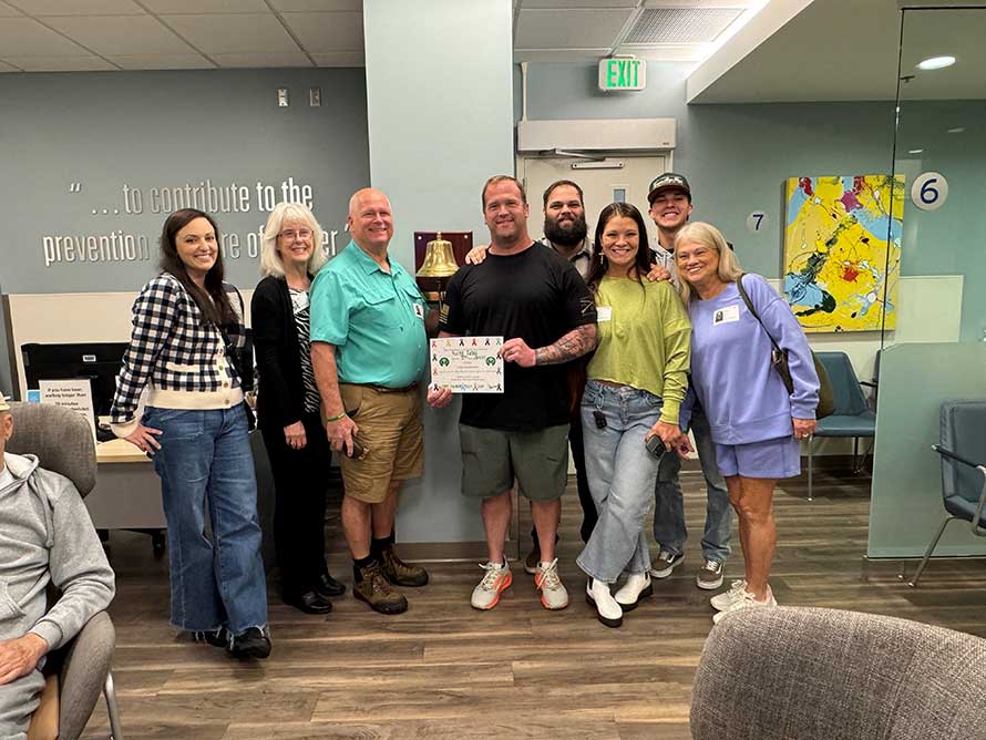 Rusty rings the bell after completing colorectal cancer treatment