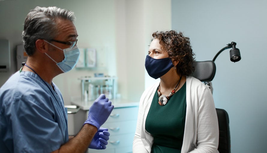 Doctor consults with patient