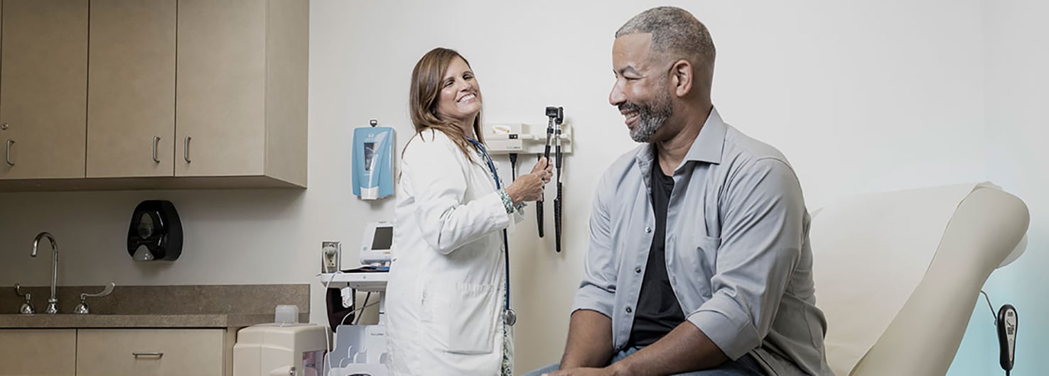 Dr. Melissa Alsina with a patient