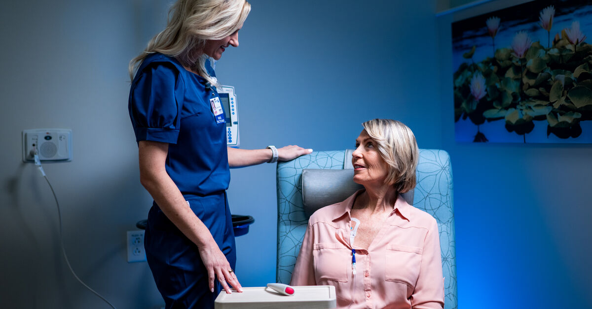 patient with with nurse in infusion center